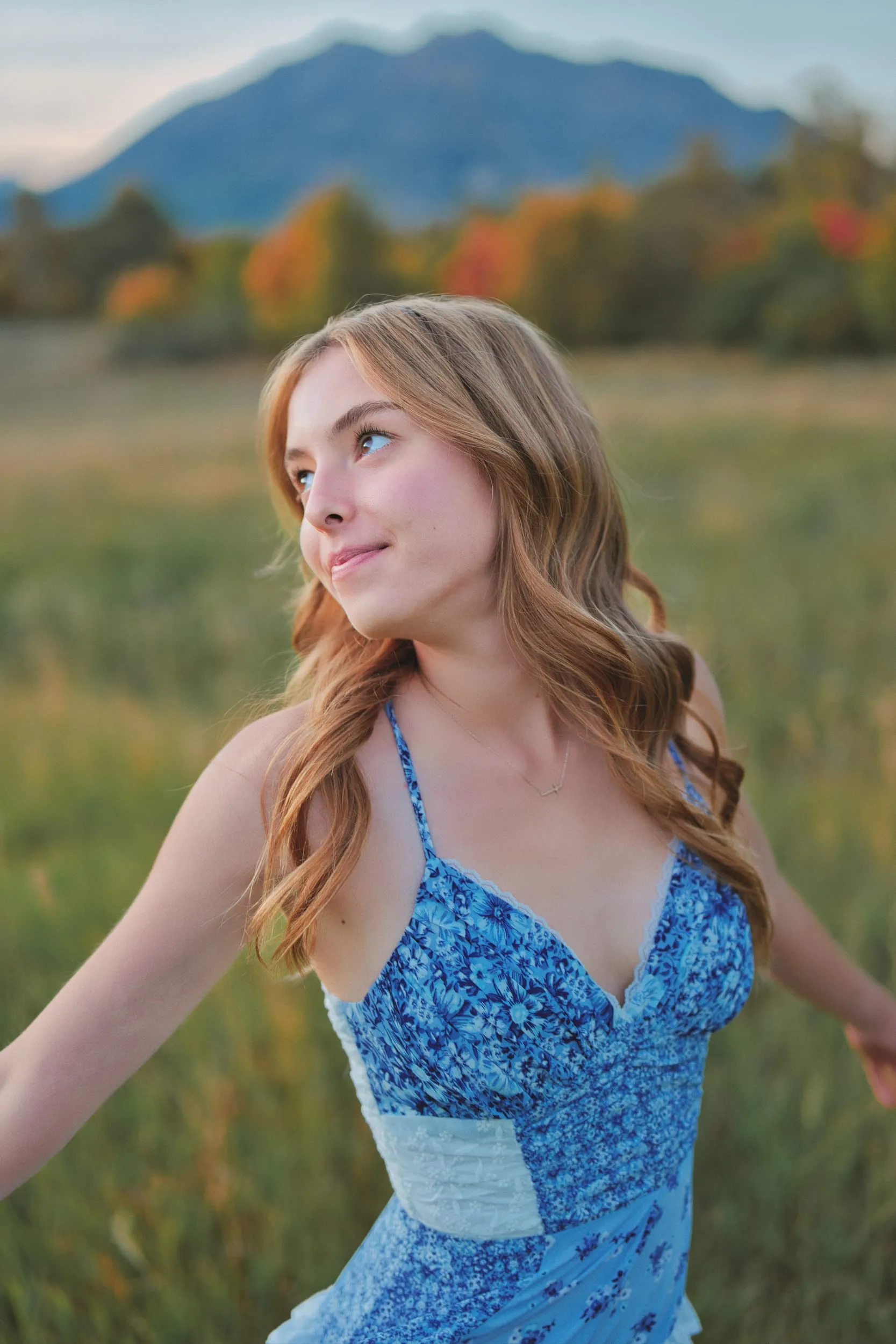golden hour meadow portrait blue dress