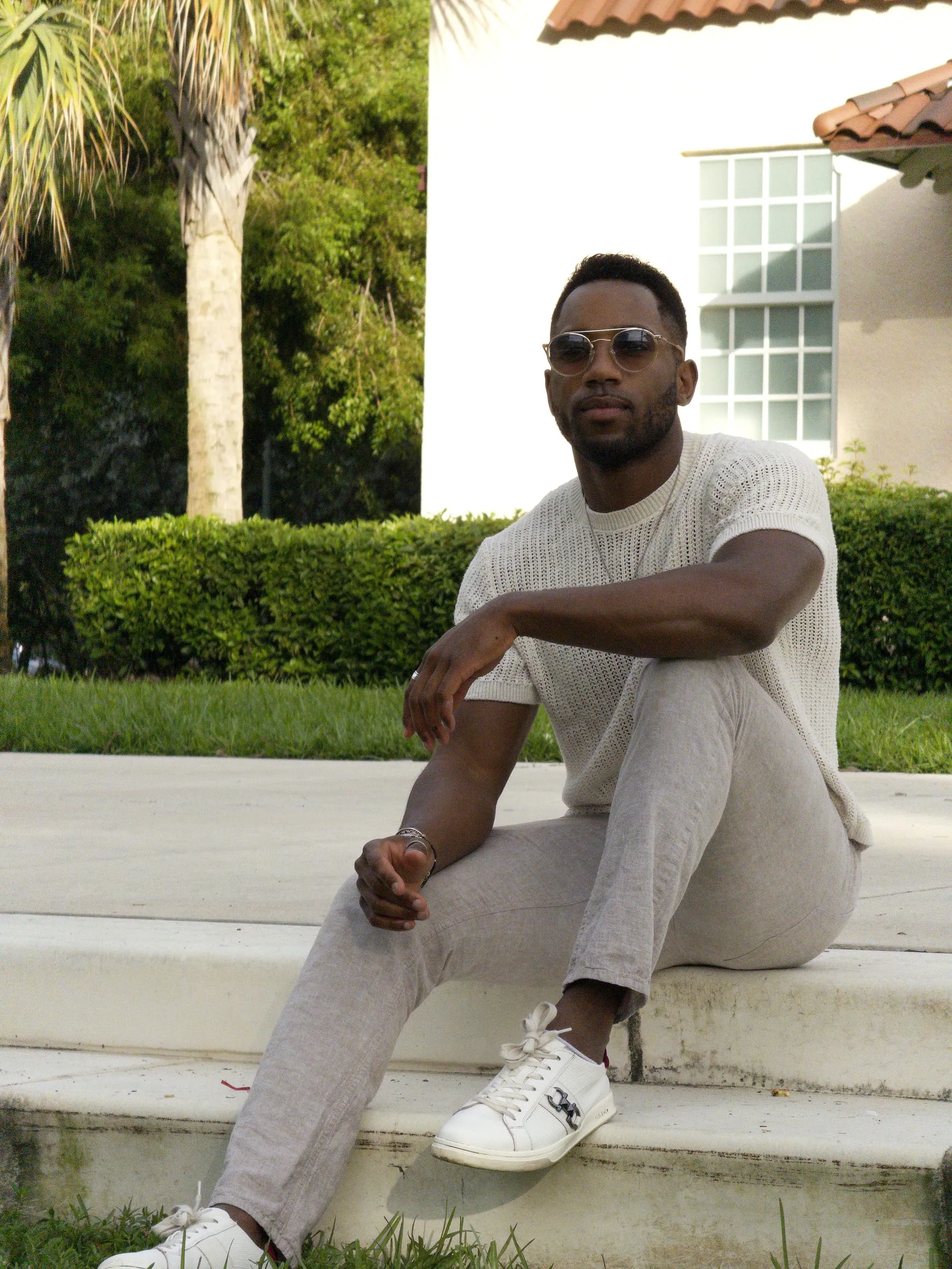 mens fashion portrait seated on steps